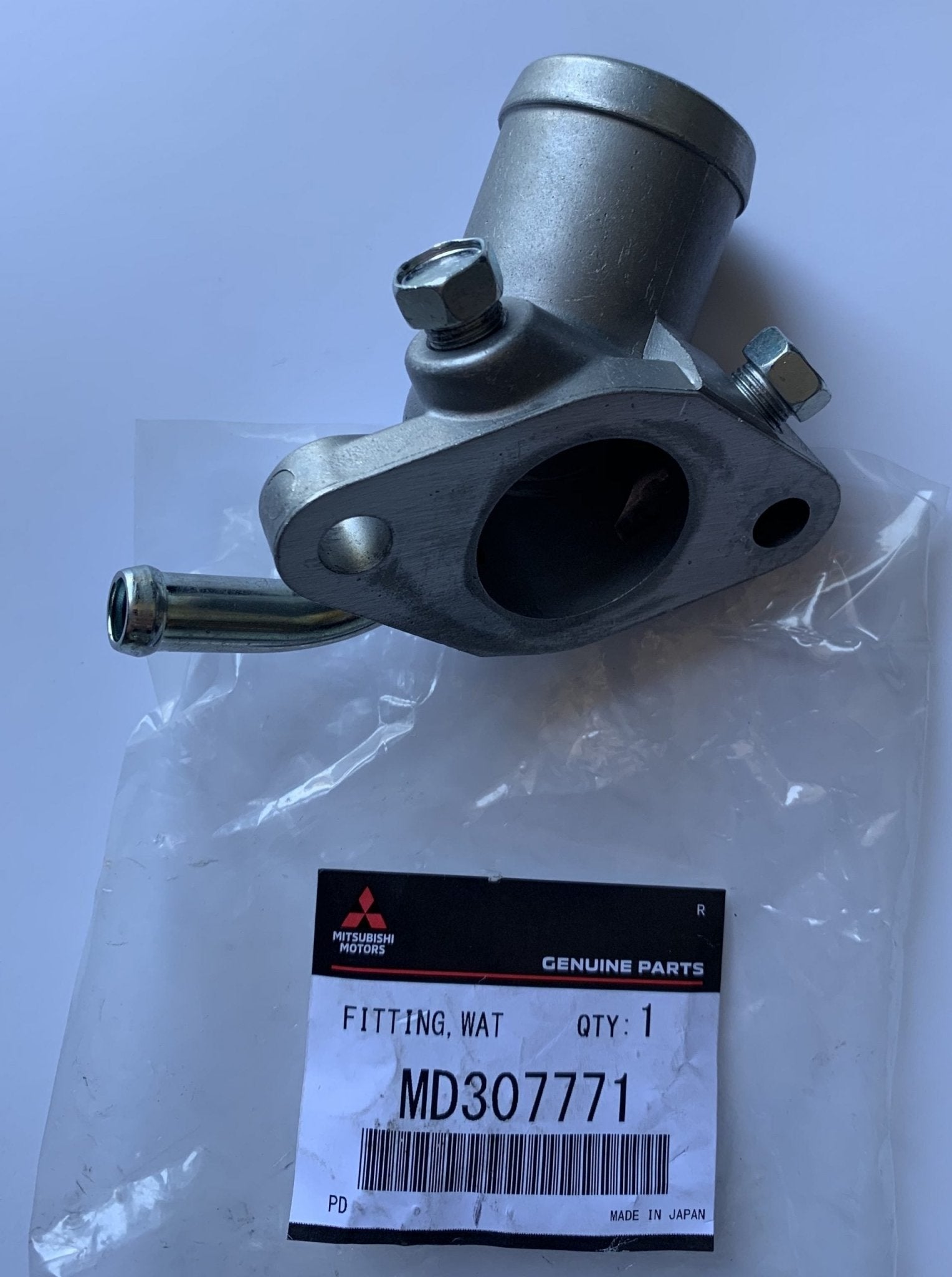 FLANGIA TERMOSTATO/ RACCORDO USCITA ACQUA MITSUBISHI PAJERO II (ORIGINALE) - Autoricambi4x4